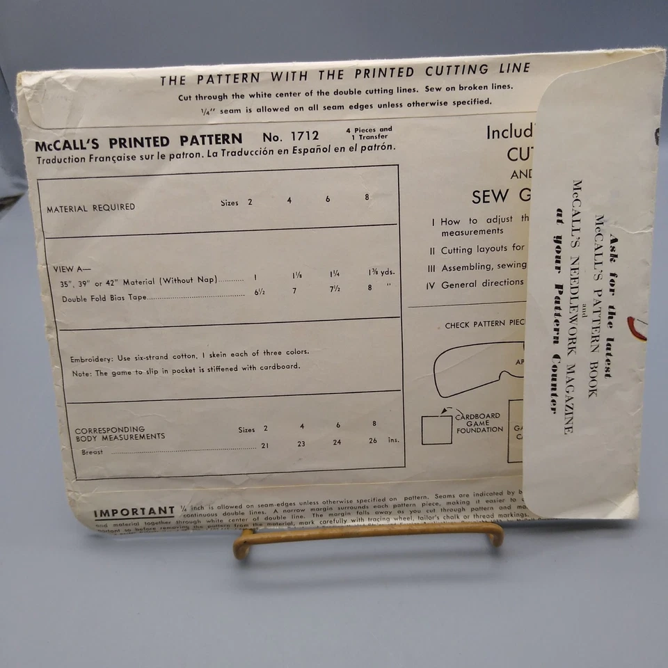 UNCUT Sewing PATTERN McCalls 1712, Childs 1952 Cobbler Apron with Tic Tac Toe - Image 2 of 2