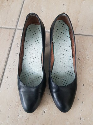 well worn used cabin crew shoes