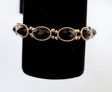Charming Charlie Gold Tone Bracelet Black Stones J12-1329