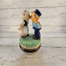 Vintage Ceramic Dutch Kissing Boy and Girl Rotating Music Box Figurine