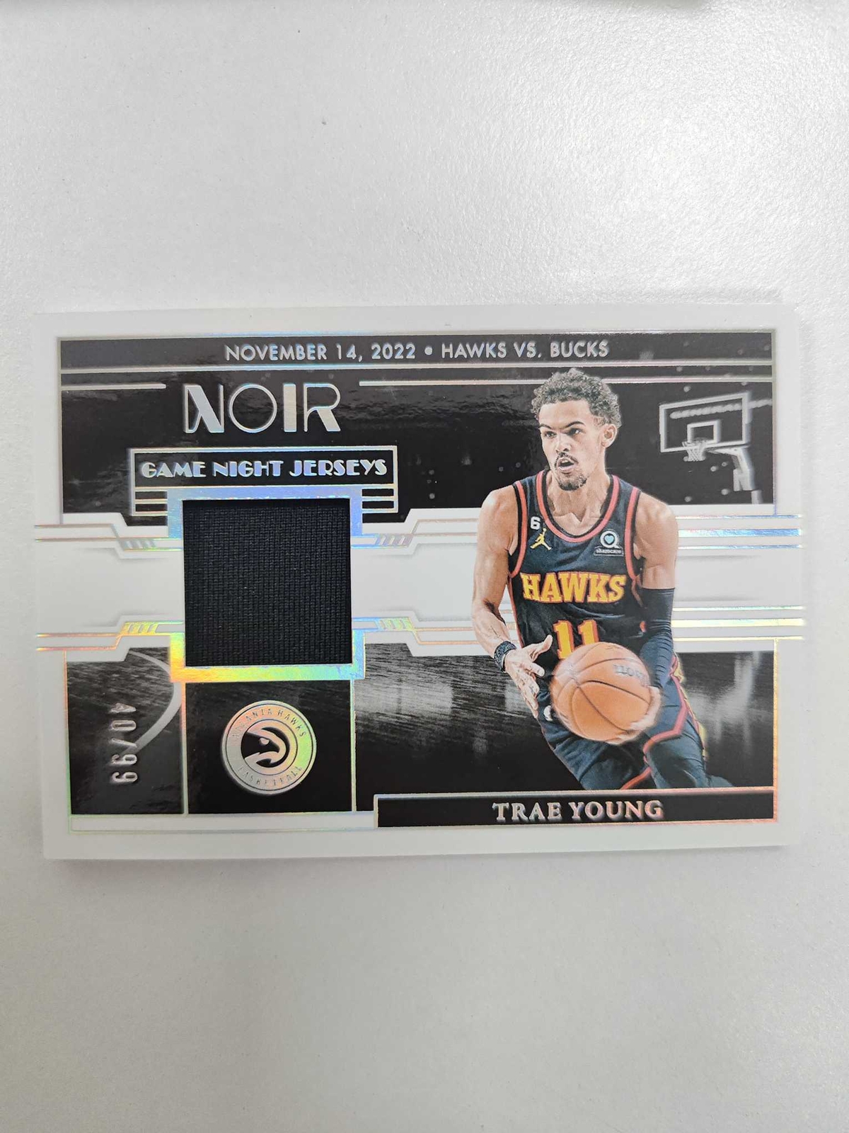 Trae Young 2023-24 Panini Noir Patch Silver Game Night Jerseys Bucks /99 -GK