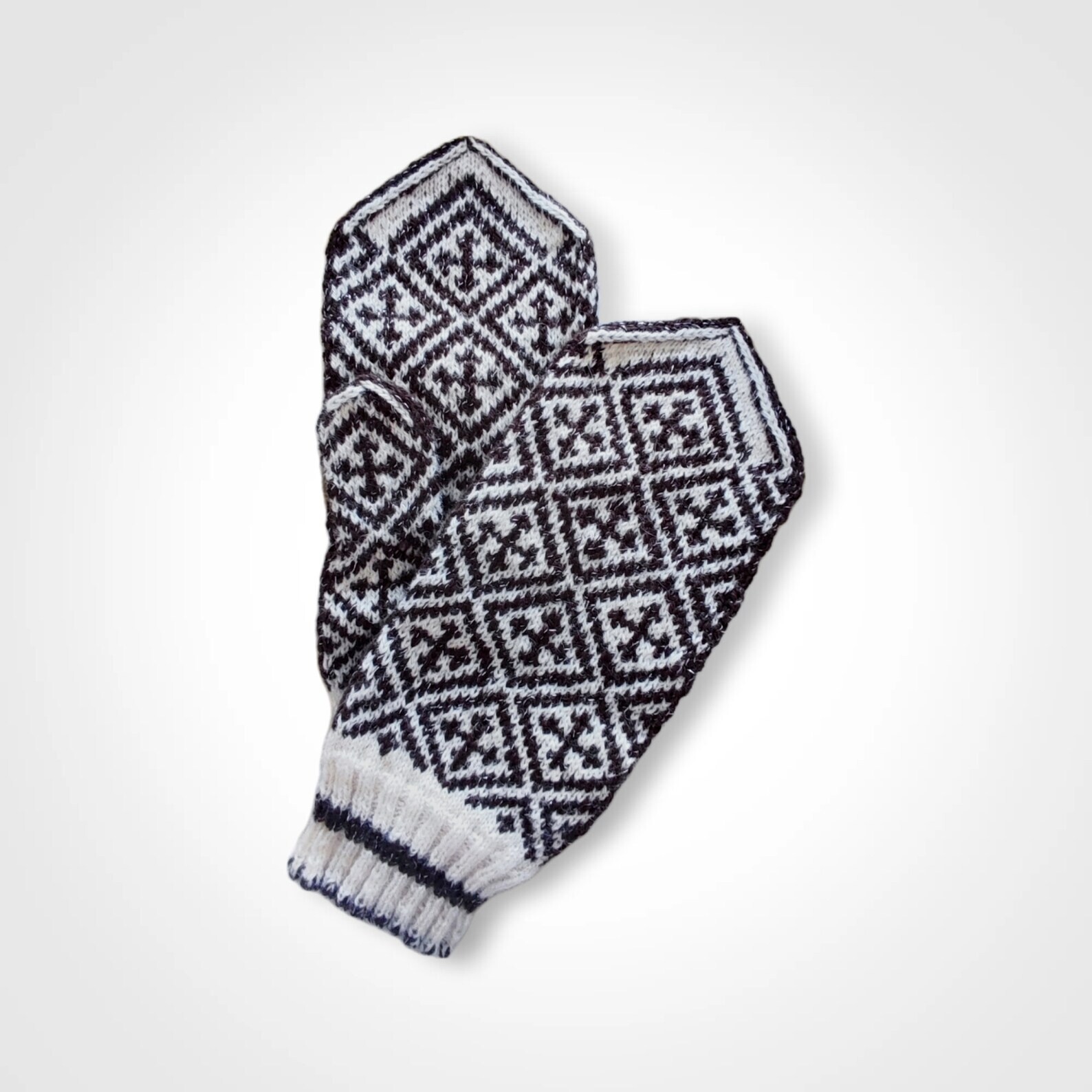 White and black knitted patterned mittens with silver thread Warm hand warmers