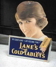 antique LANE'S COLD TABLETS cardboard STORE STANDING DISPLAY kemp leroy ny GIRL