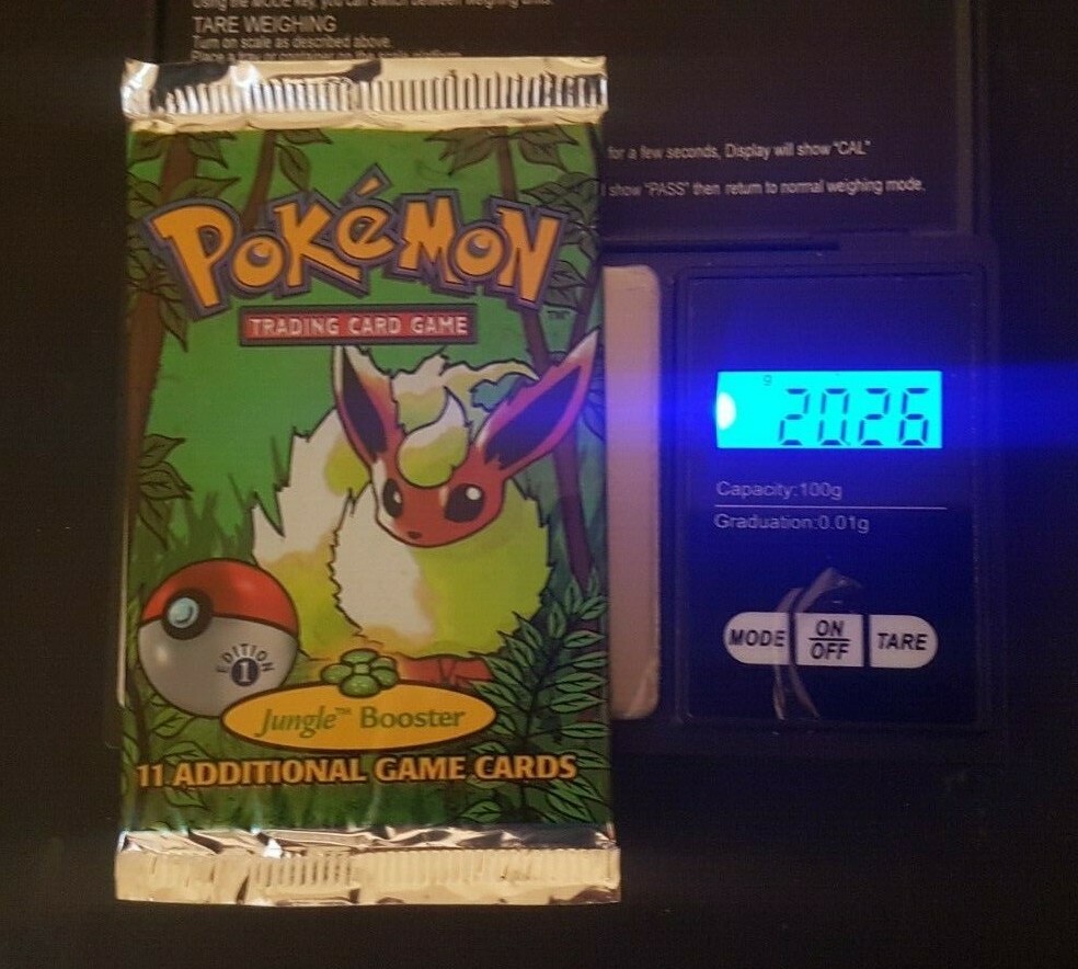 Pokemon 1st Edition Jungle Sealed Booster Pack Flareon artwork