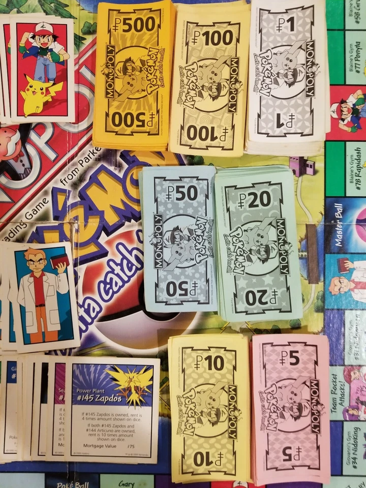 JUEGO DE MESA MONOPOLY POKEMON 1999 SOLO PIEZAS DE REPUESTO Foto 3 de 4