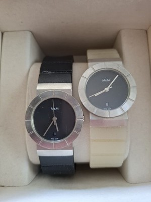 Zwei Damen-Armbanduhren M&M schwarz weiß  mit Silikon-Armband gebraucht