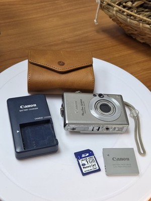 Canon PowerShot SD600 6.0MP 3x Zoom Compact Digital ELPH Camera + SD + Charger