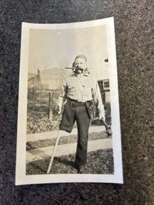 Man Dressed as Peg Leg Pirate Wielding Pistol and Mace 1945 Photograph