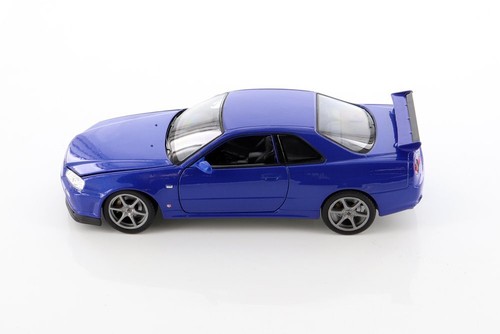 NISSAN SKYLINE GT-R (R34) 1/24 scale DIECAST CAR WELLY 24108/4D - Picture 4 of 5