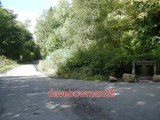 PHOTO  SHANKLY MEMORIAL AND LANE TO GLENBUCK. THE VILLAGE OF GLENBUCK IS NOW PAR