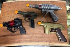 lot of 4 vintage toy cap rambo ,startrek ,Larami http: pages.ebay.com/help/pol