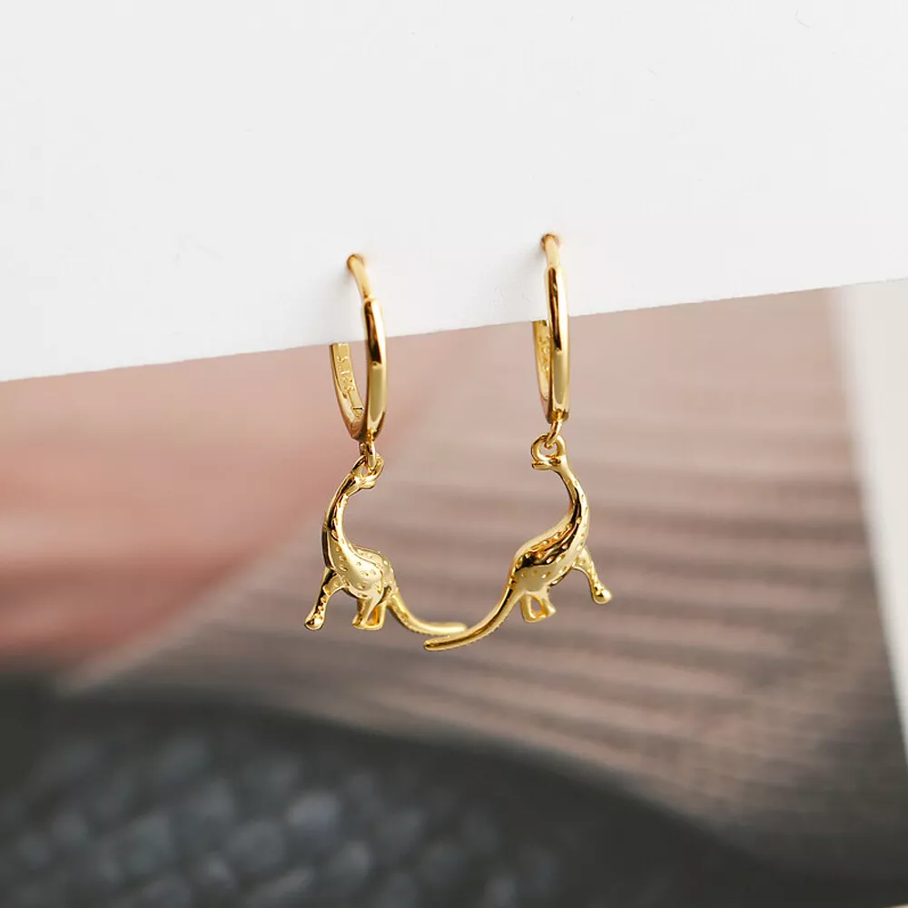 Huggie hoop 2024 earrings with charm