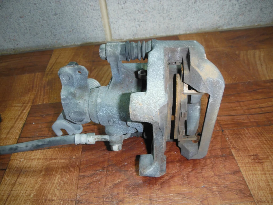 06-09 PINZA FRENO TRASERO IZQUIERDO FORD FUSION MERCURY MILAN Foto 2 de 4