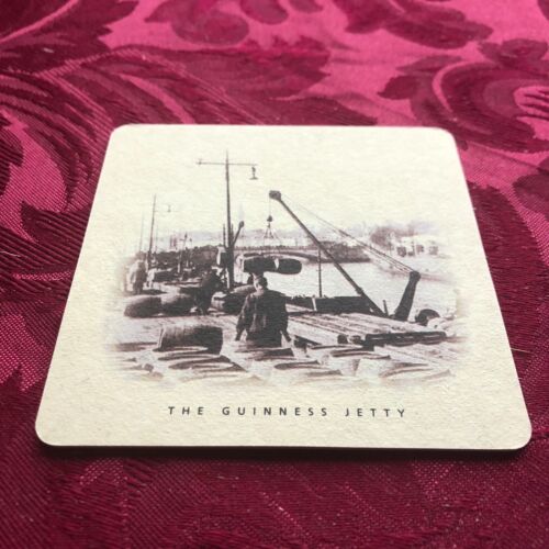 BREWERIANA - GUINNESS - THE GUINNES JETTY - BEER MAT - TRAY 146 - Picture 1 of 2