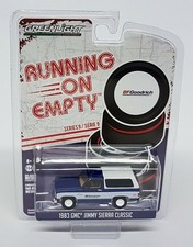Greenlight 1/64 1983 GMC Jimmy Sierra Classic Running On Empty BF Goodrich