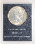 1923 PEACE SILVER DOLLAR PARAMOUNT INTERNATIONAL HOLDER-LIGHT TONING