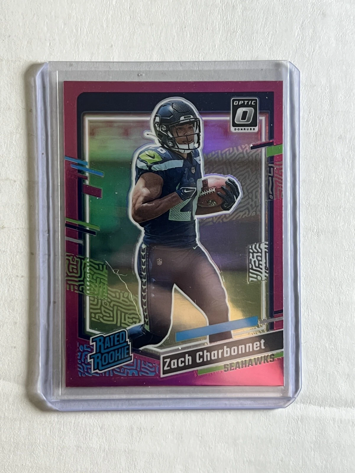 2023 Donruss Zach Charbonnet Rated Rookie Optic Preview Pink Prizm No. 392 RC