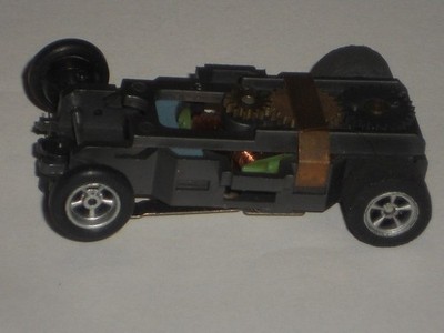 AURORA AFX NON MAGNATRACTION CHASSIS RUNS PERFECT