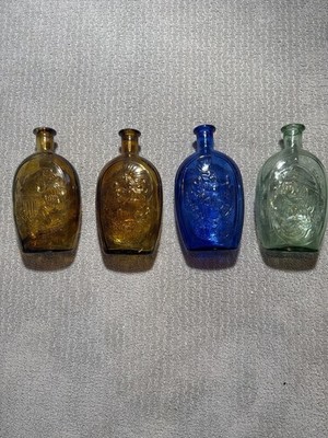 Lot of 4 Collectible commemorative Glass Bottles, Multi-Color Amber Blue Green