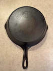 Wagner Ware Sidney -O- No. 8C  heat ring and no catalog number on the bottom.
