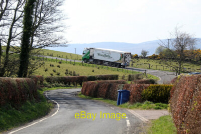Foto 6x4 West Coast Woodfuels LKW Der LKW ist gerade abgebiegt Millho c2020