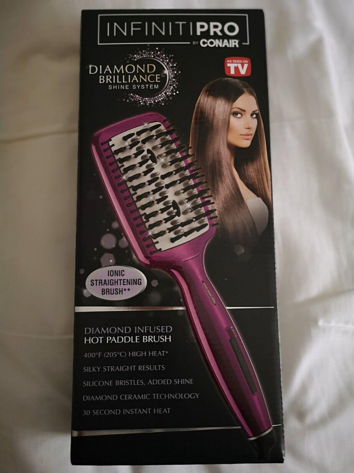 InfinitiPro By Conair Ionic Straightening Brush Includes heat mat.