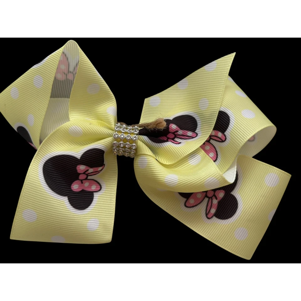 Clip de moño de pelo amarillo a lunares de Minnie Mouse para niños Disney Foto 2 de 4