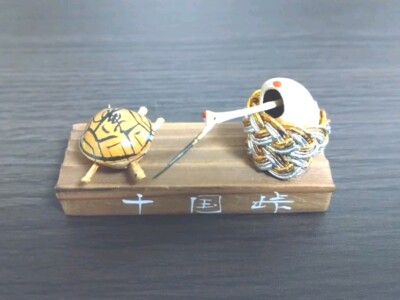 A crane and a turtle figurine Jukkoku pass  Atami  Japan lucky charm longevity