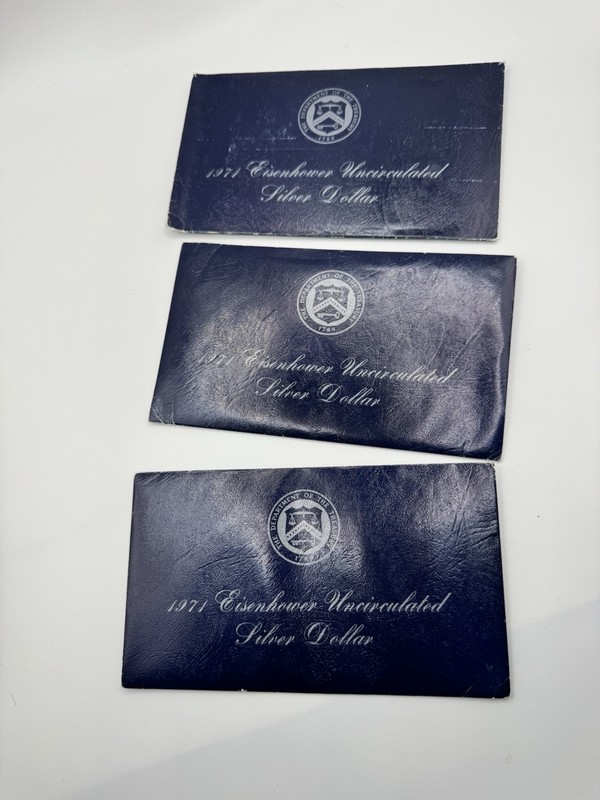 1971 -S Uncirculated Eisenhower 40% Silver Dollar w/ Blue Envelope. Lot of 3