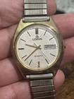 Vintage Lorus By Seiko Day Date Gold Tone Men's Quartz Watch 36mm Y573-8060