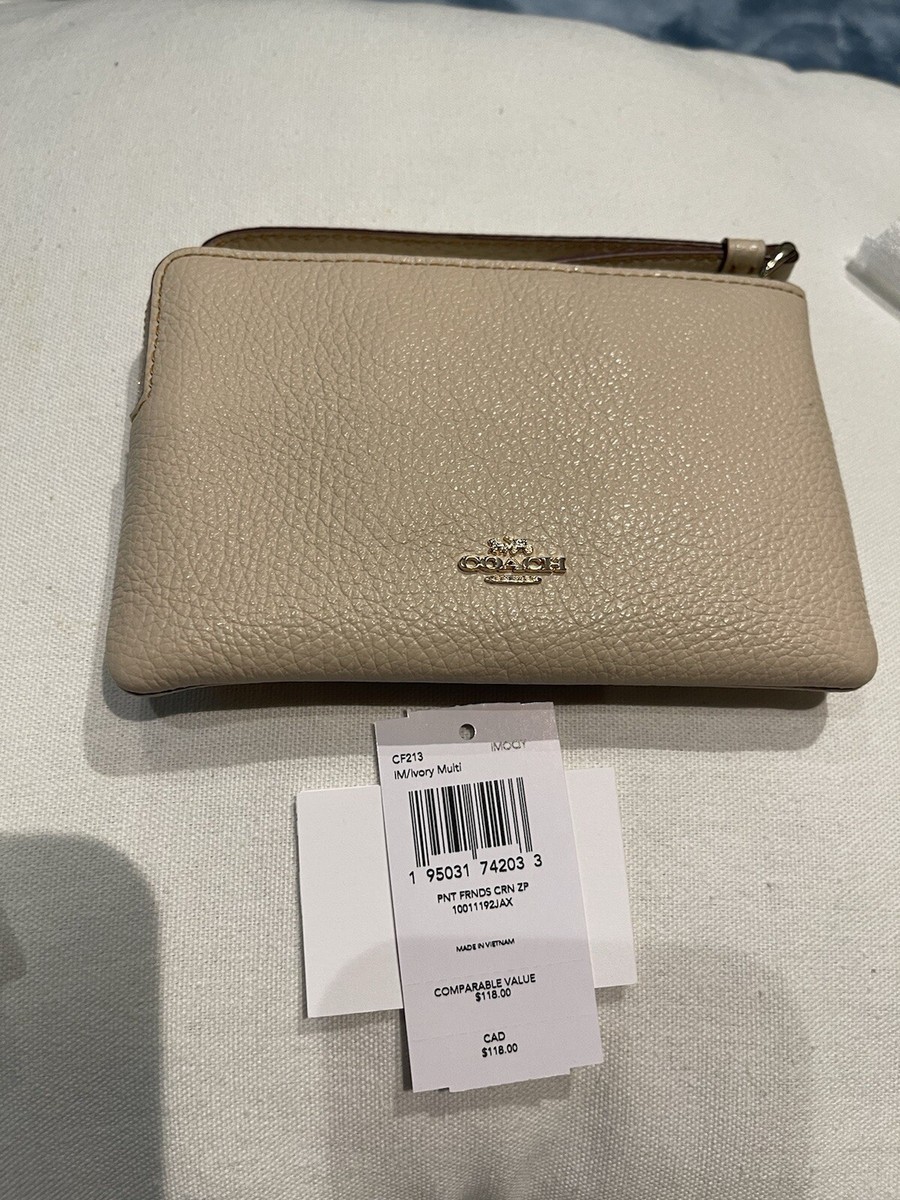 Coach X Peanuts Corner Zip Wristlet With Snoopy And Friends Motif