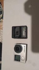 GoPro HERO4 Action Camera - Silver With Battery pack  Tested works