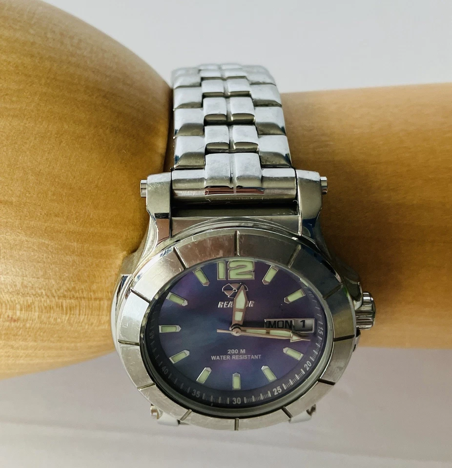 Reloj deportivo Reactor Quark 66014 cara púrpura para dama usado Foto 3 de 4