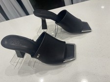 Viral  DKNY Kellyn Square-Toe Slip-On. Black synthetic lining. 7