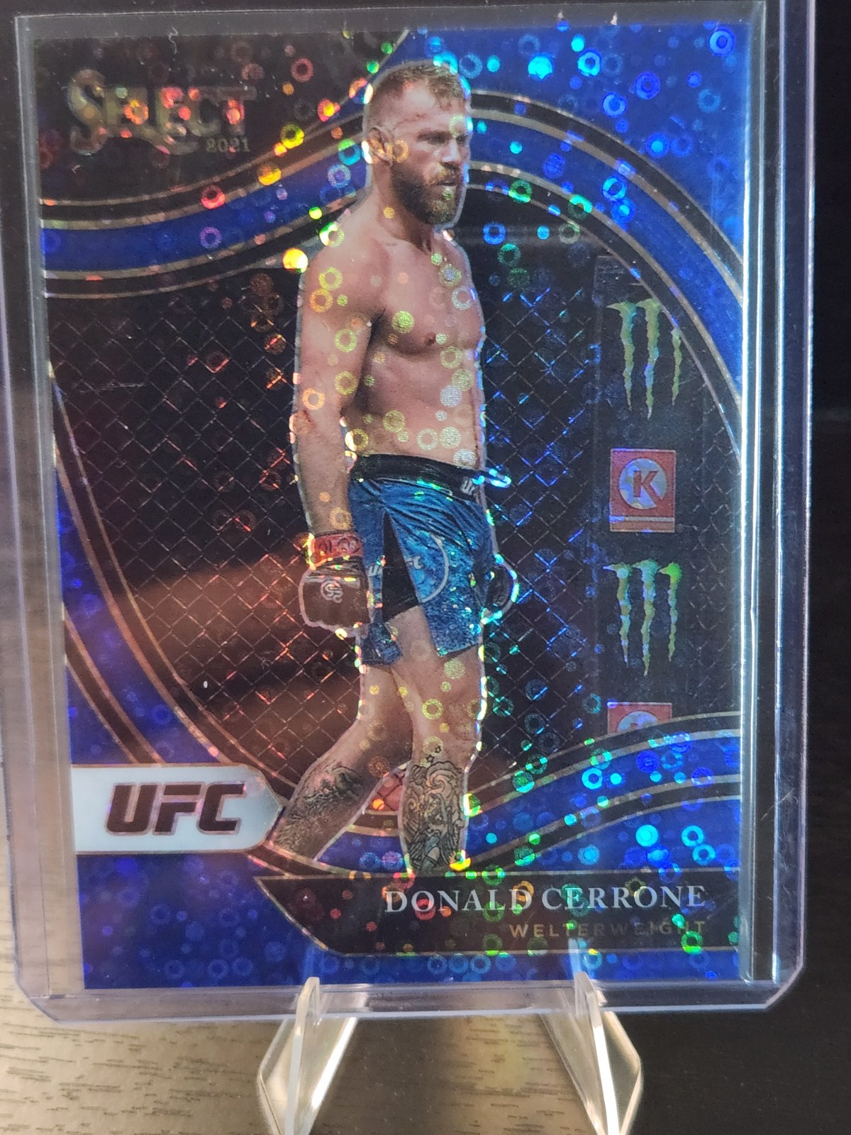 2021 Panini Select UFC Octagonside Donald "Cowboy" Cerrone Blue Disco /99