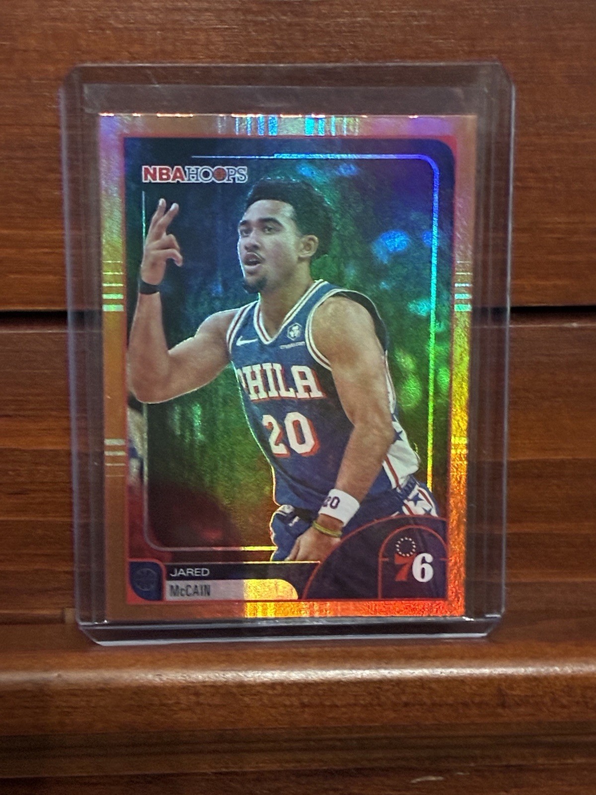 Jared McCain 2025-26 NBA Hoops #197 Orange Parallel Philadelphia 76ers