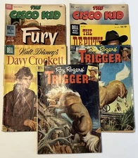 LOT OF 7 DELL COMICS. The Cisco Kid, Roy Rogers Trigger, Dave Crocket, Fury