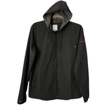 VUORI Outdoor Trainer Shell Jacket in dark charcoal grey size M