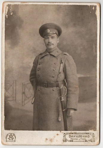 WWI. Russian officer with a saber and revolver 1916 Russian Empire Cabinet Card