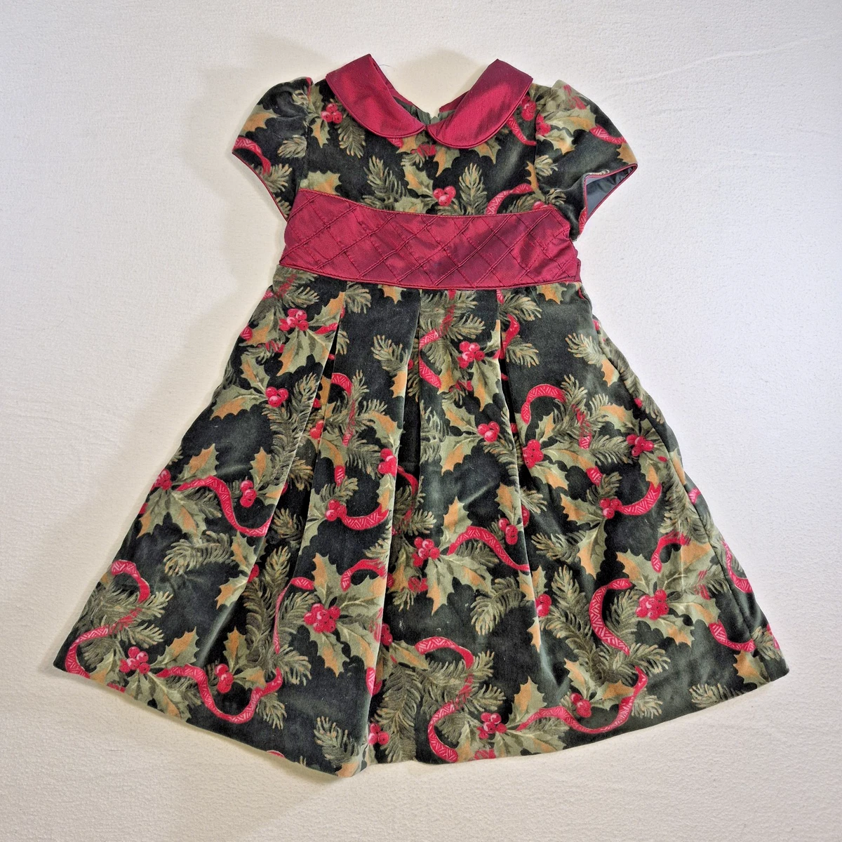 laura ashley christmas dress Laura Ashley bottle green velvet and embossed taffeta dress from the Autumn/Winter 1990 catalog. |