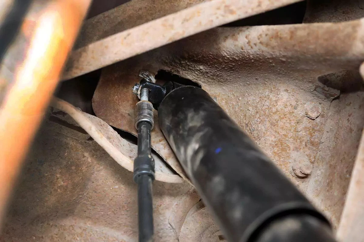 The new shock absorber is installed using the original hardware.