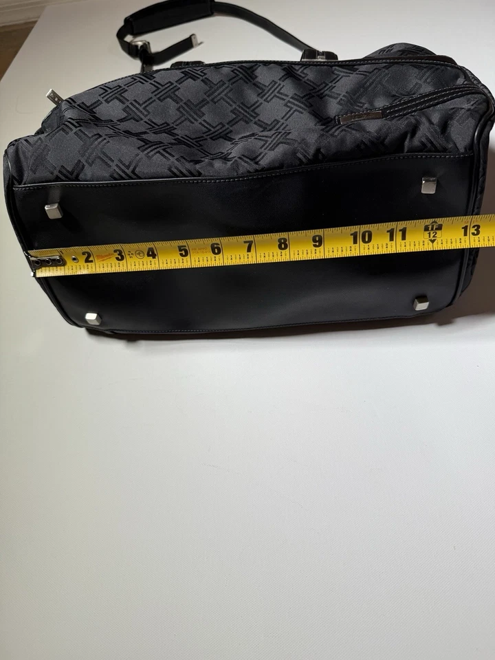 Bolso de hombro Tumi negro con ribete de cuero para computadora portátil Bolso de viaje Trabajo Gimnasio llevar Foto 3 de 4