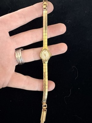 Rogers Women's Oval Gold-Tone Bracelet Wristwatch White Dial Analog Stick/Arabic
