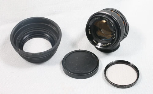 Original Tomioka Auto Revuenon 55mm f/1.4 M42 screw mount lens 200714 Genuine