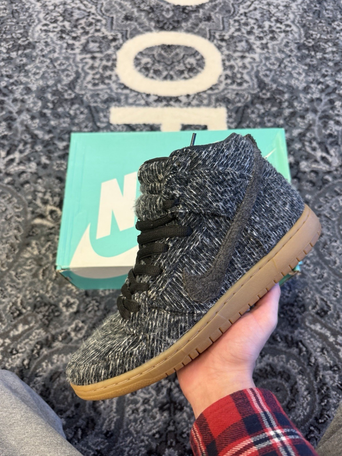 10M - Nike SB Dunk High Warmth Pack With A Black Woven Upper And A Gum Bottom