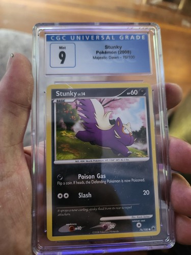 CGC 9 MINT 2008 Majestic Dawn 76/100 Stunky Pokemon Card - Picture 2 of 3
