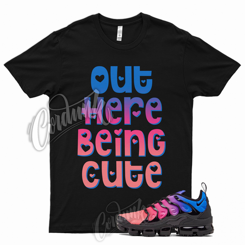 pink blue and black nike shirt