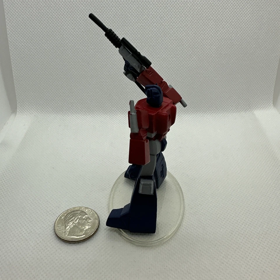 Transformers SCF PVC Act 6 Optimus Prime Convoy con Pistola Megatron - Color Estaño Foto 4 de 4