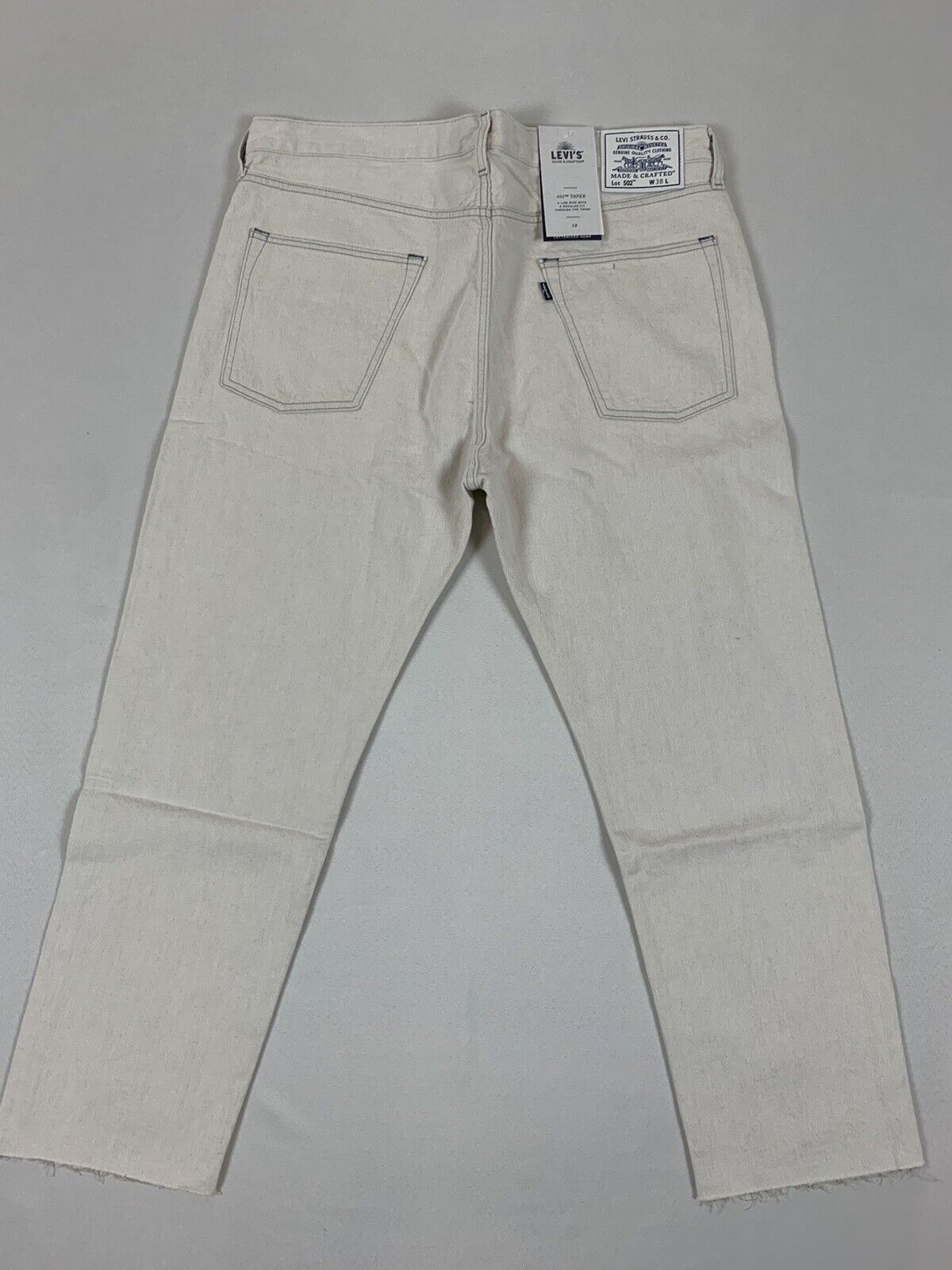 LEVIS MADE AND CRAFTED LMC 502 TAPER FIT CROPPED JEANS WHITE SAND 