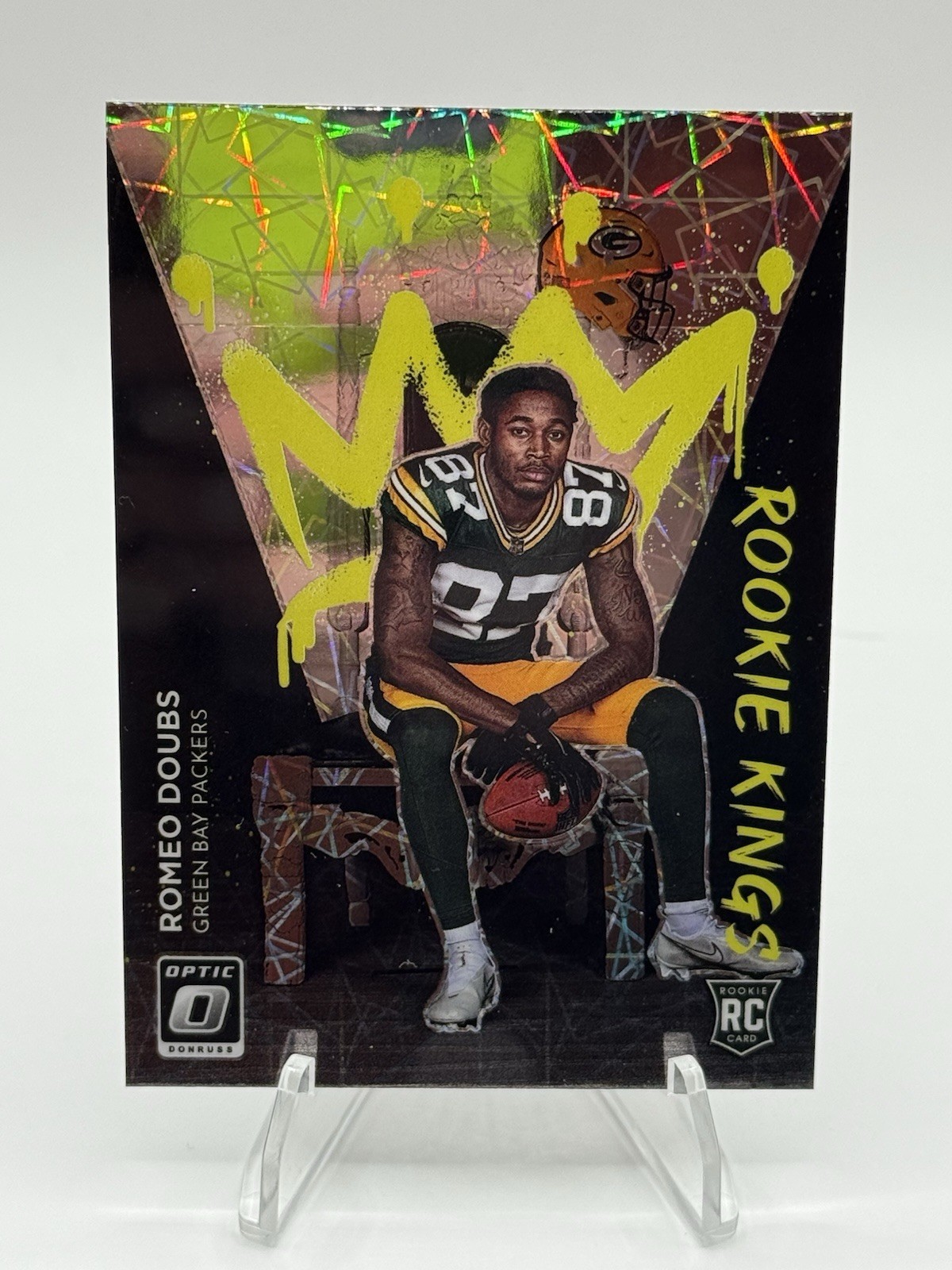 2022 Donruss Optic #RK-12 Romeo Doubs Rookie Kings Laser Case Hit